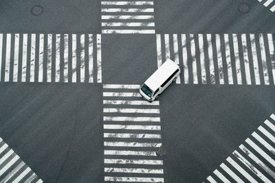 High angle view of road sign on street