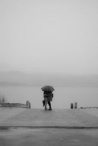 Rear view of woman in sea