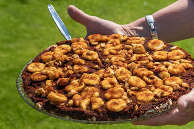 Close-up of hand holding bread