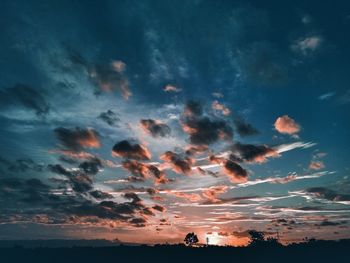 Low angle view of dramatic sky during sunset