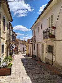 Alley amidst buildings in town