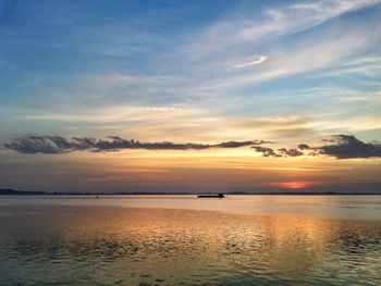 Scenic view of sea at sunset