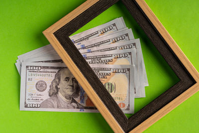 High angle view of information sign on green background