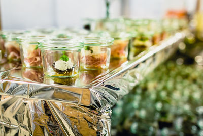 Close-up of glass jar on table