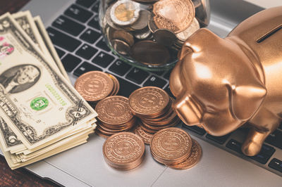 High angle view of coins on table