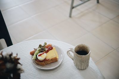 High angle view of breakfast served on table
