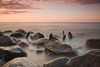 View of calm sea at sunset