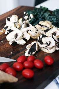 High angle view of vegetables on cutting board