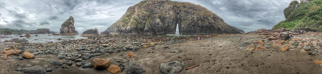 Panoramic view of rocks against sky