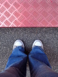 Low section of person standing on ground