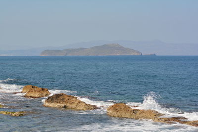 Scenic view of sea against clear sky