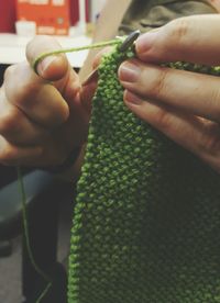 Close-up of hands knitting