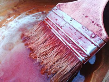 High angle view of paintbrushes on table