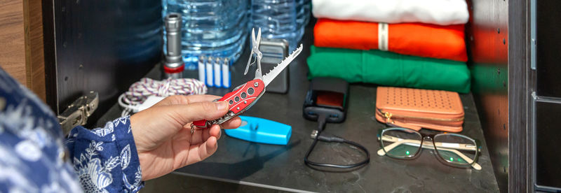 Cropped image of man repairing car