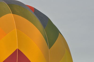 Low angle view of hot air balloon against clear sky