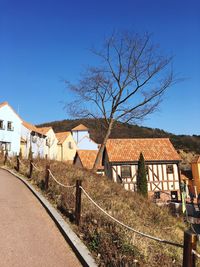 Houses against clear sky