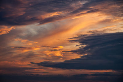 Low angle view of clouds in sky during sunset