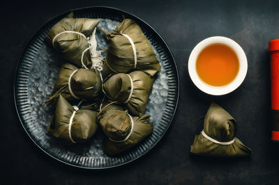 Zongzi is a delicacy that chinese people must eat during the dragon boat festival 