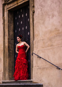 Person standing on brick wall