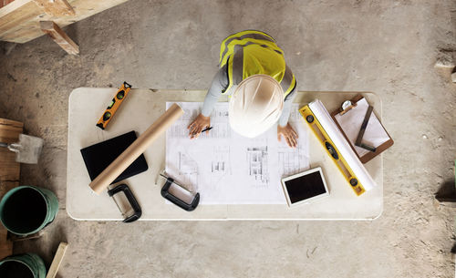 High angle view of work tools on table