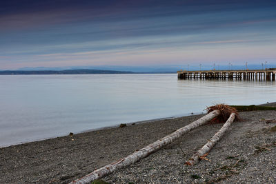 Pier over sea against sky