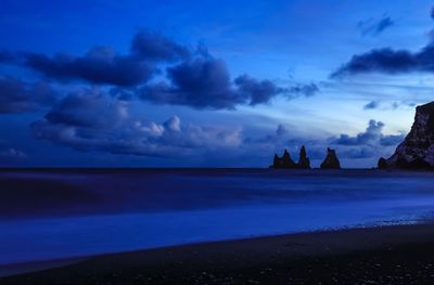 Scenic view of sea against sky at sunset