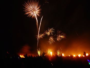 Low angle view of firework display