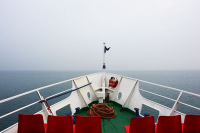 Ship on sea against clear sky