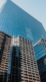 Low angle view of modern building against clear sky