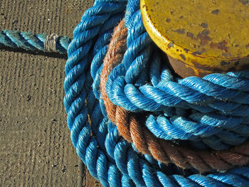 High angle view of ropes tied 