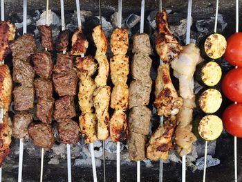 High angle view of kebabs on barbeque