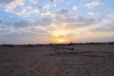 Scenic view of landscape at sunset