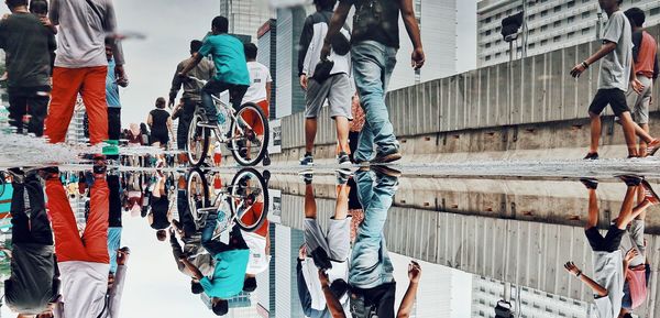 Group of people walking in city