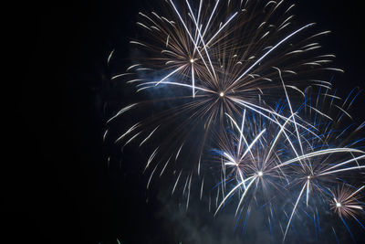 Low angle view of firework display