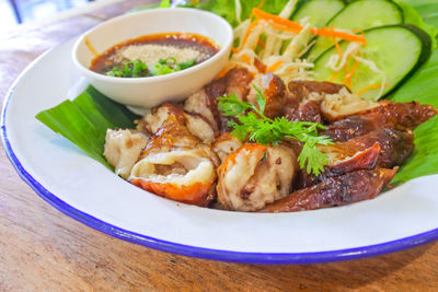 High angle view of meal served in plate on table