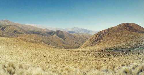 Scenic view of mountains against clear sky