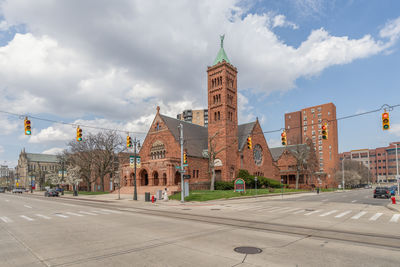 Buildings in city against sky