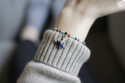 Close-up of woman hand wearing bracelet