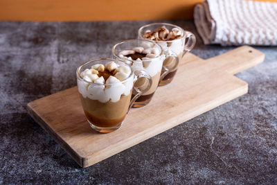 Assortment of mini chocolate desserts in the glass. mini choloate desserts on a rustic background