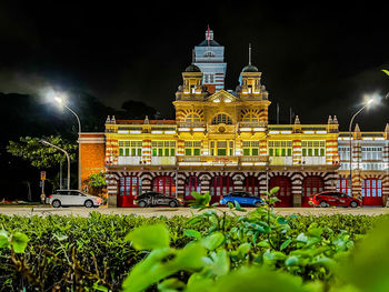 Illuminated buildings in city at night