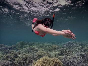 Man swimming in sea