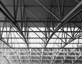 Low angle view of metallic structure against sky