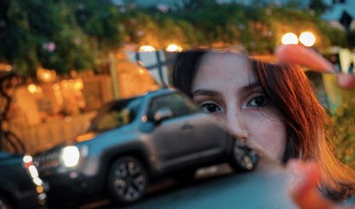 Portrait of woman in car