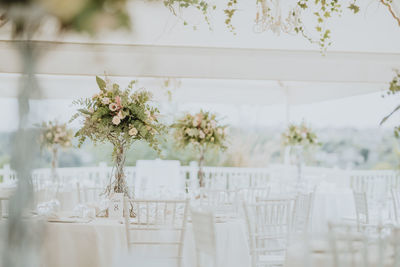 Floral bouquet on table during wedding ceremony