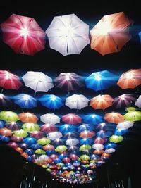 Colorful lanterns hanging in row