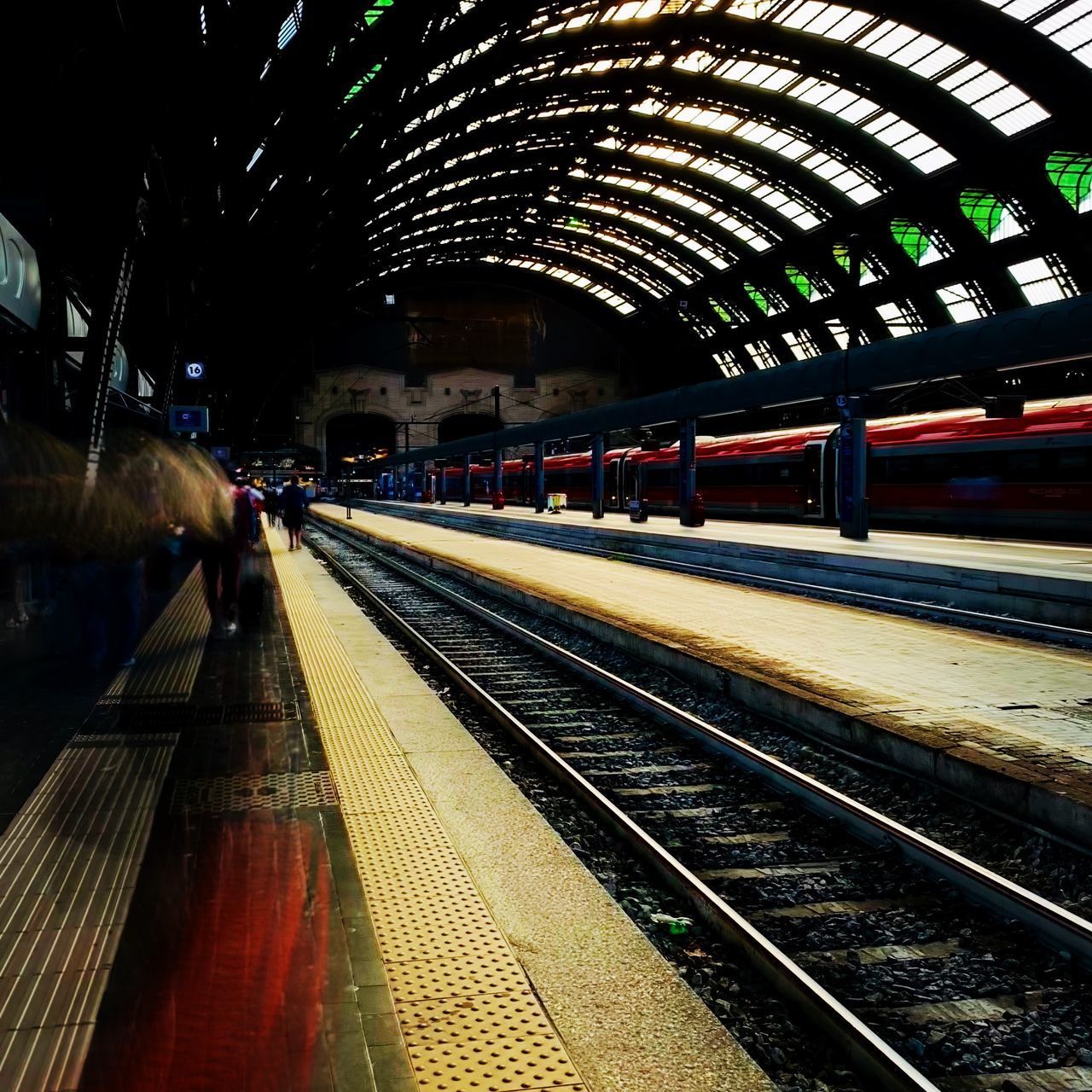 RAILROAD STATION PLATFORM IN CITY