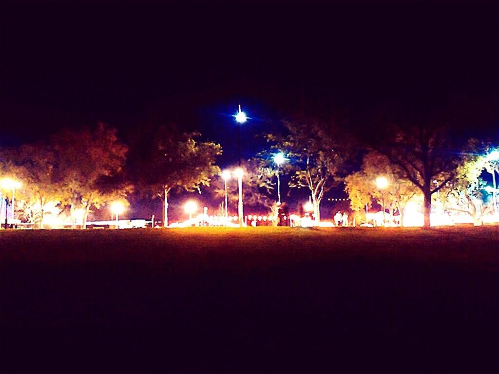 VIEW OF ILLUMINATED STREET LIGHT AT NIGHT