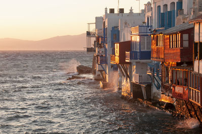 Panoramic view of the village of mykonos island with terraces and balconies overlooking the sea 