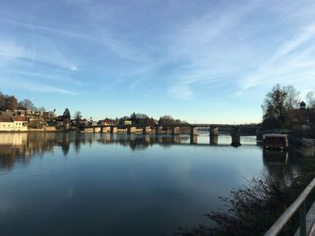 Bridge over river against sky