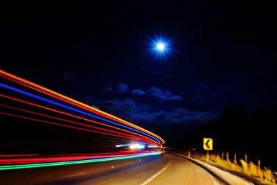 Light trails on road at night